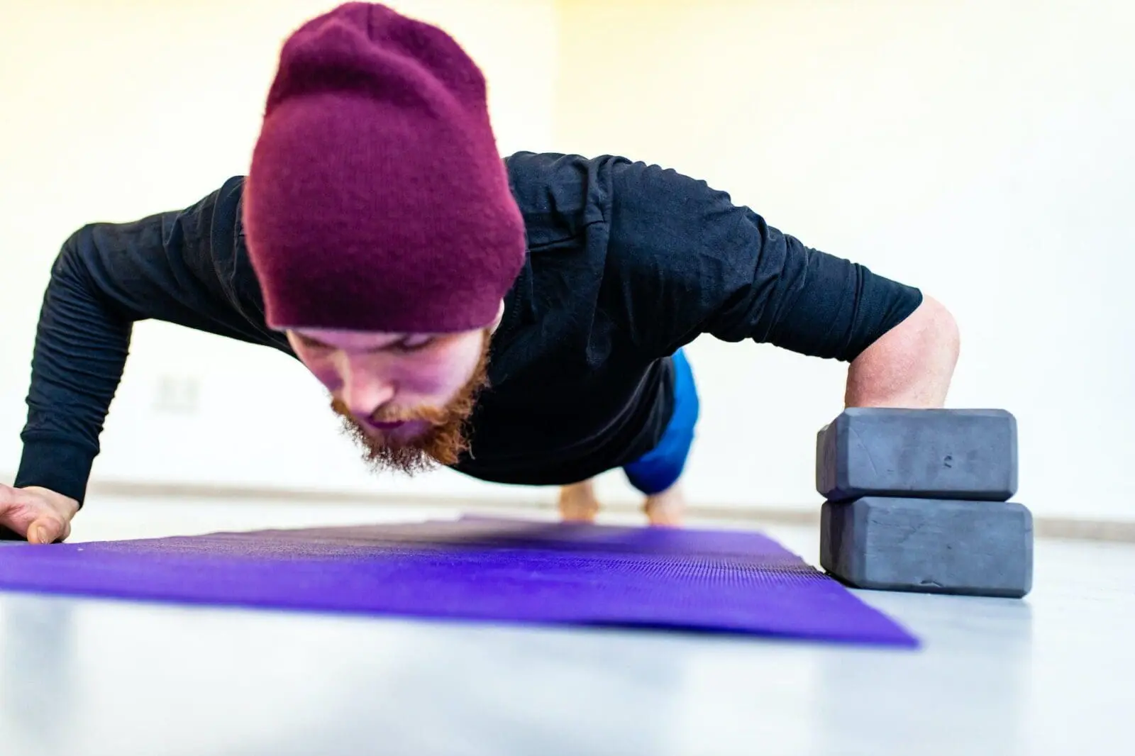 healthy lifestyle concept - man making exercises at home