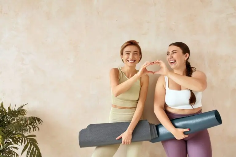 Laughing Women Posing After Yoga. Female Friends Laughing